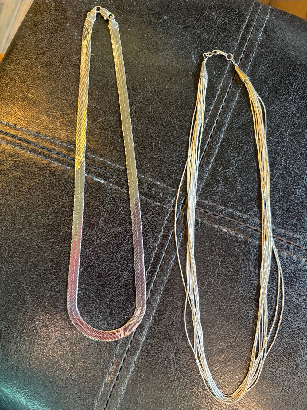 Two Silver-Tone Necklaces